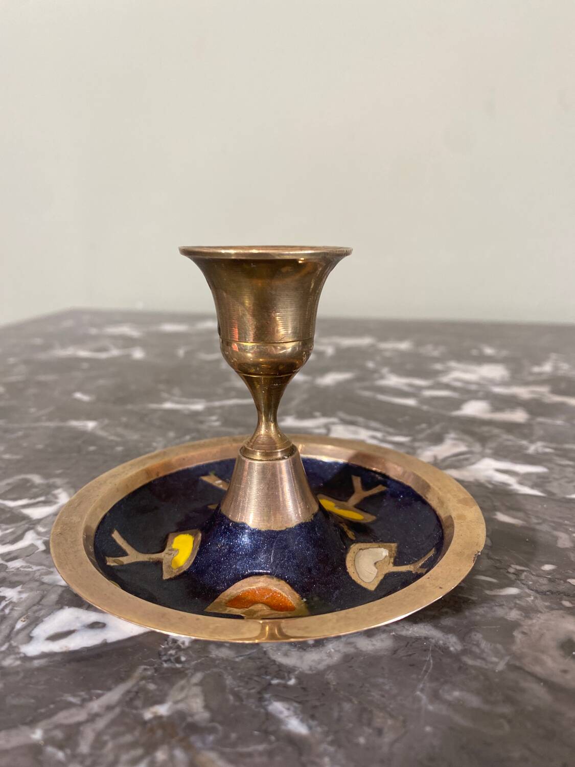 Enameled brass candle holder