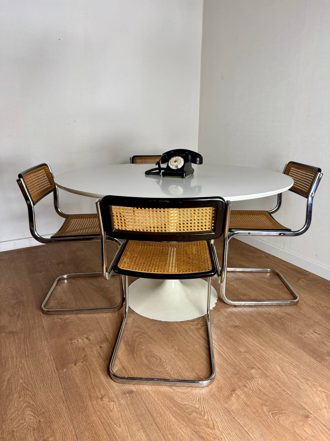 White round tulip-legged table attributed to Arkana