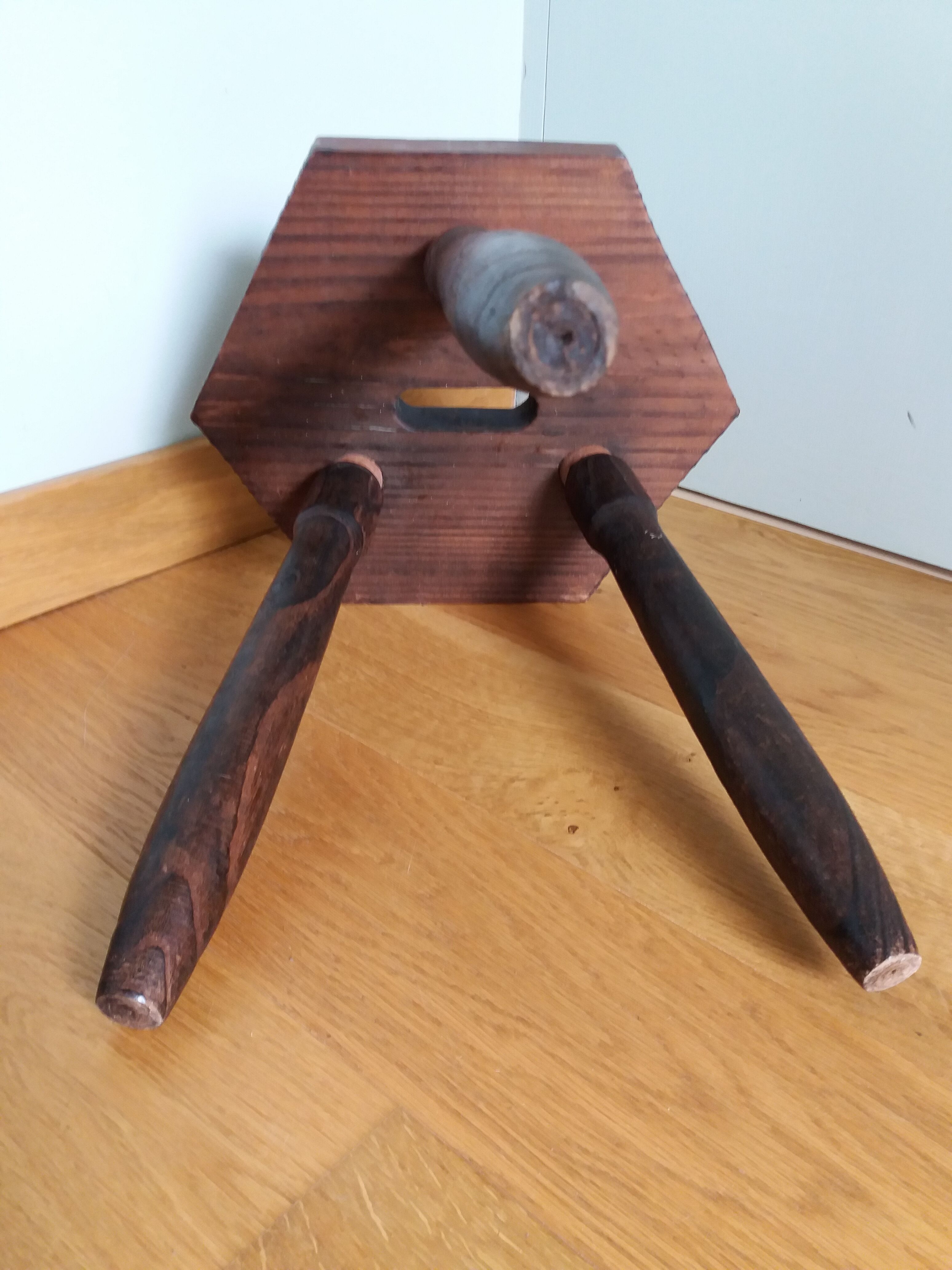 Wooden tripod stool