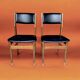 Pair of Scandinavian chairs in wood and black skai