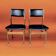 Pair of Scandinavian chairs in wood and black skai