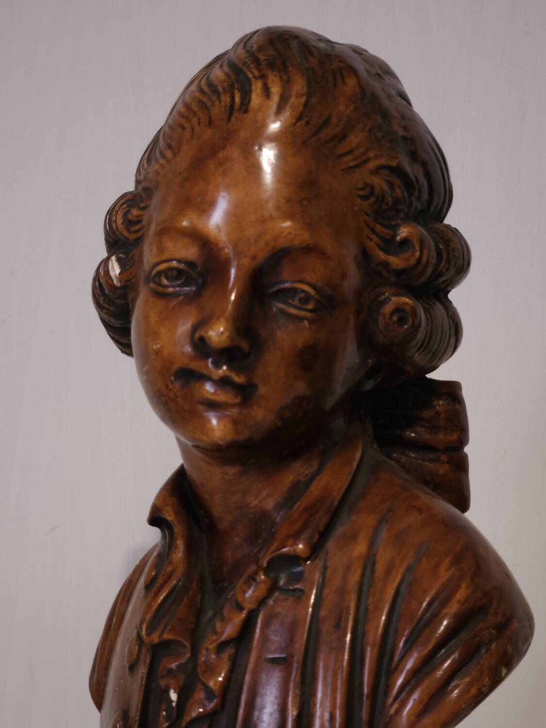 Bust of a young man in antique plaster.