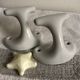 Pair of white porcelain hooks