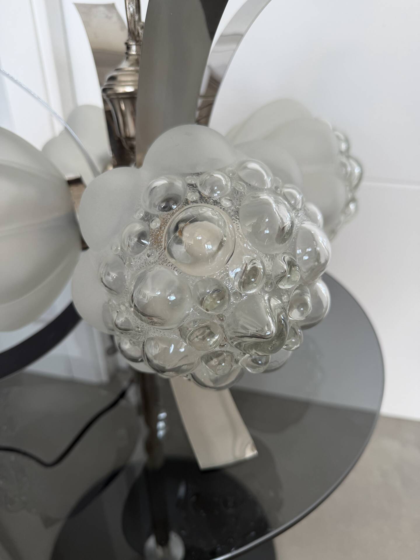 Vintage chandelier with 4 glass bubble globes and silvered metal.