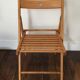 2 folding wooden chairs