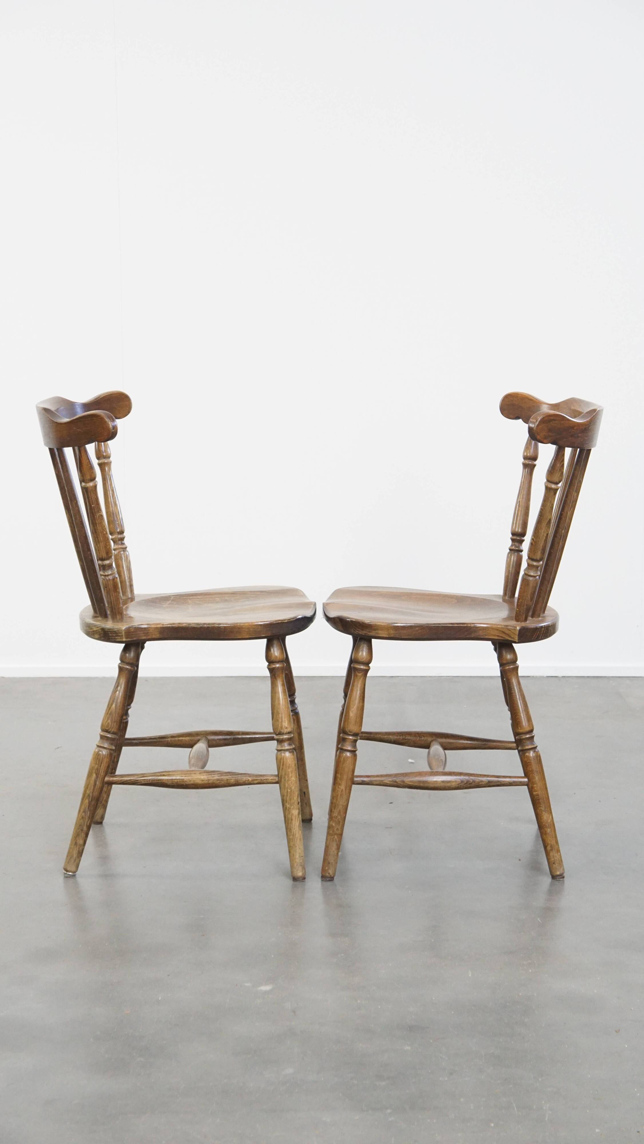 Set of 8 antique wooden spindle chairs