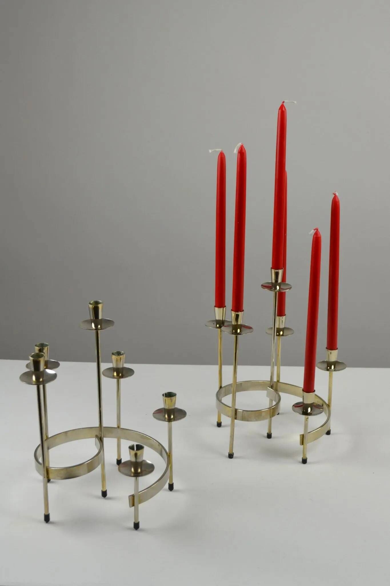 Pair of white metal candle holders "Spiral" by Gunnar Ander for Ystad-Metall, Sweden, 1960s.