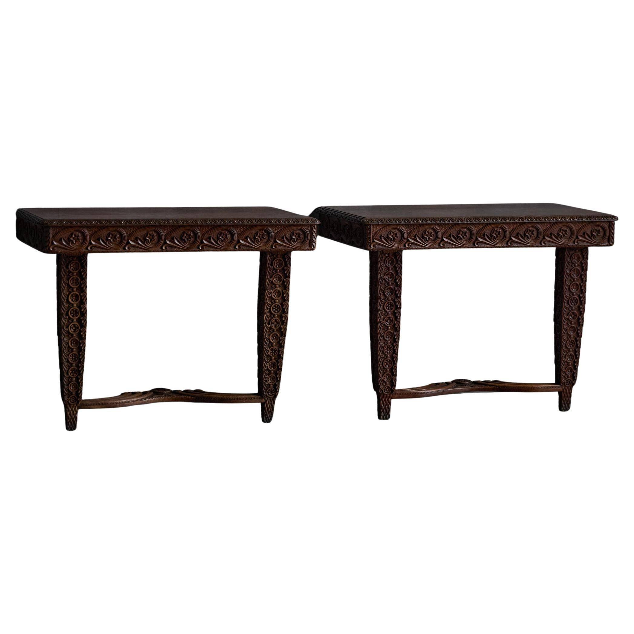 Hand-carved ornate wooden console tables, France, late 19th century