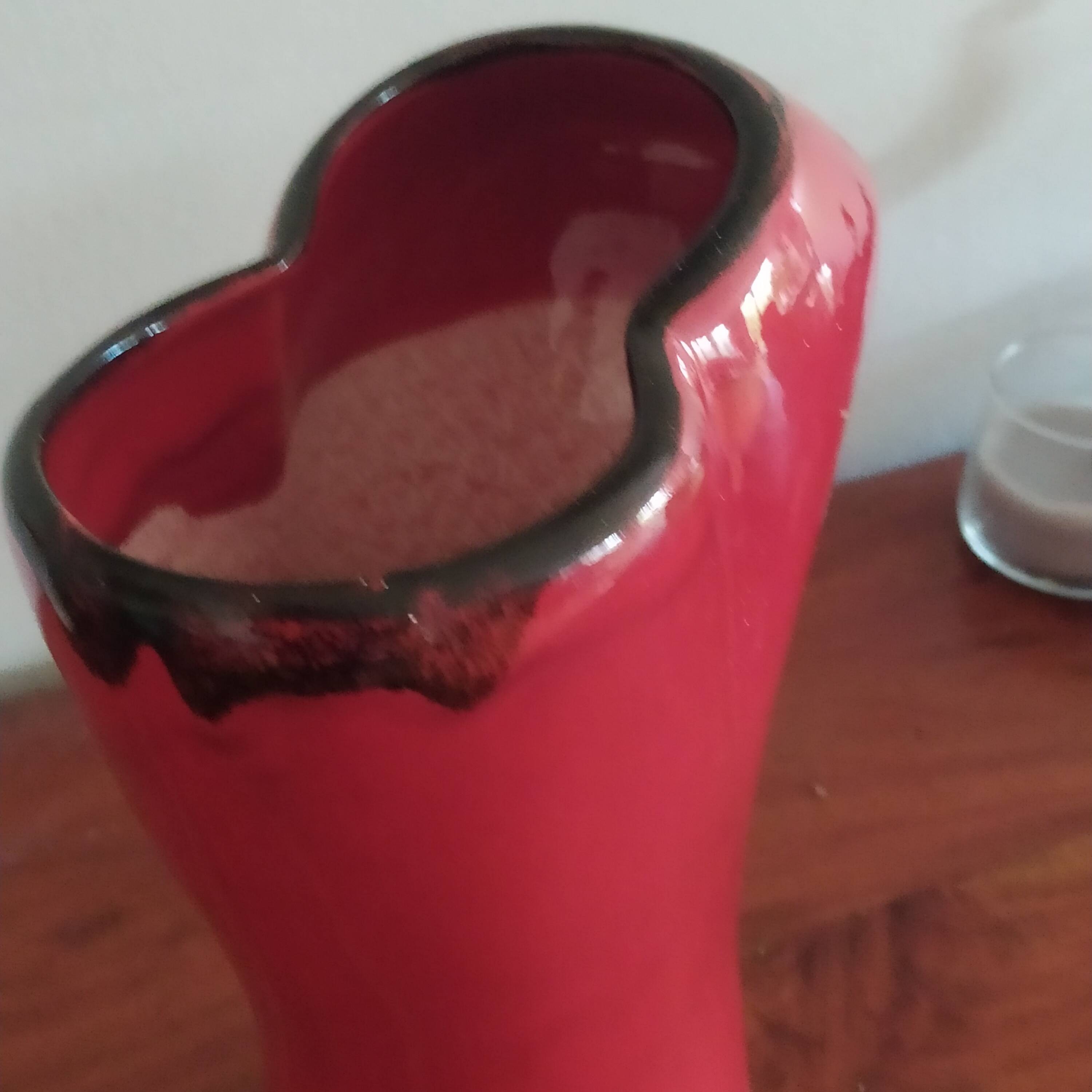 red ceramic designer vase by Les Grottes de Dieulefit