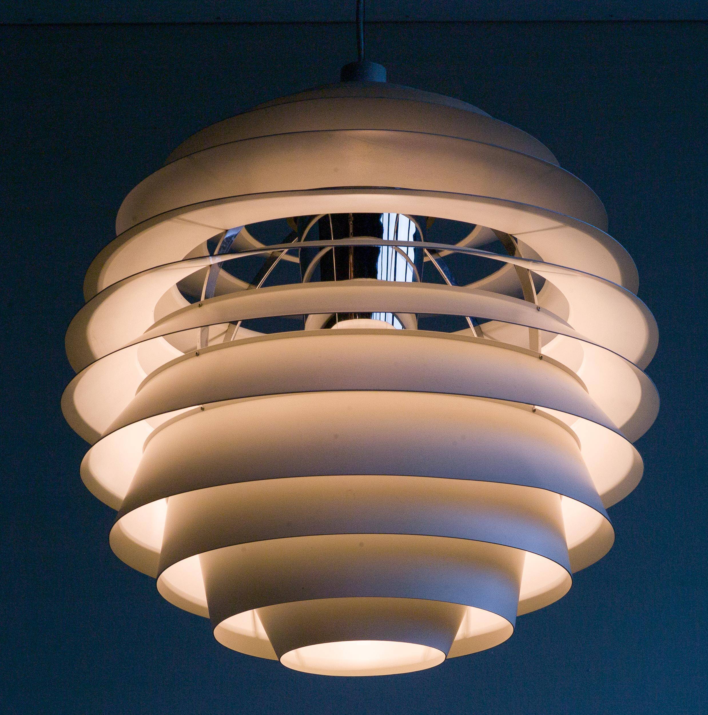 Large pendants from the early last century from the Louvre by Poul Henningsen for Louis Poulsen, 1962.