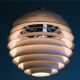 Large pendants from the early last century from the Louvre by Poul Henningsen for Louis Poulsen, 1962.
