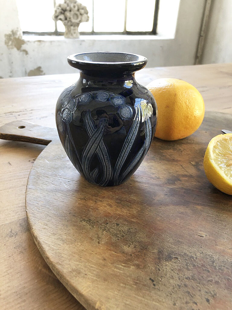 Artisan vase with floral motifs