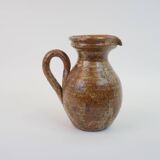 Brown speckled stoneware pitcher in very good condition