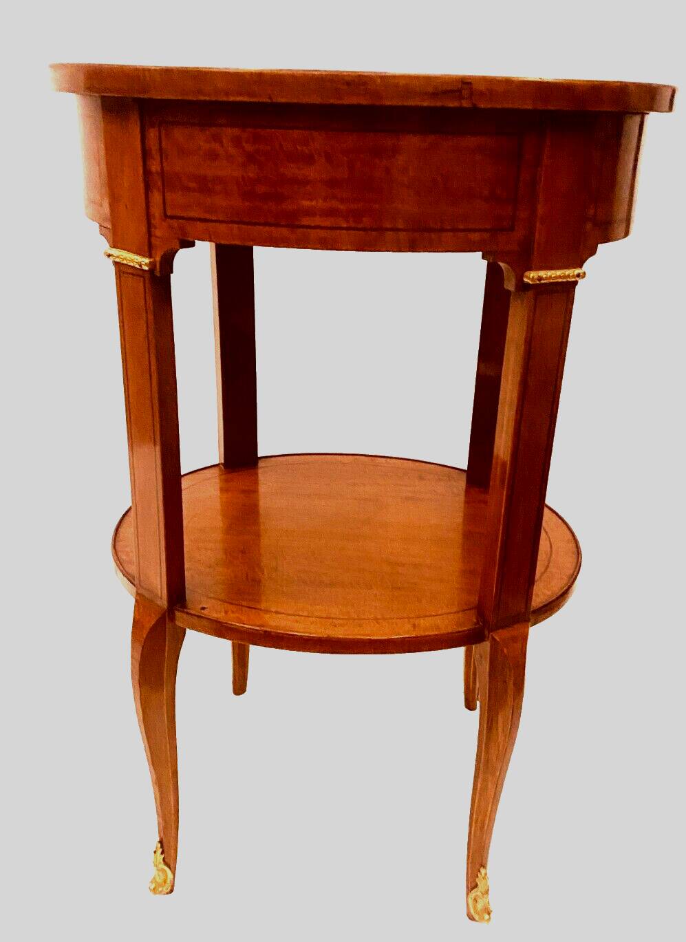 Oval pedestal table in veneer wood and black wood net 20th century