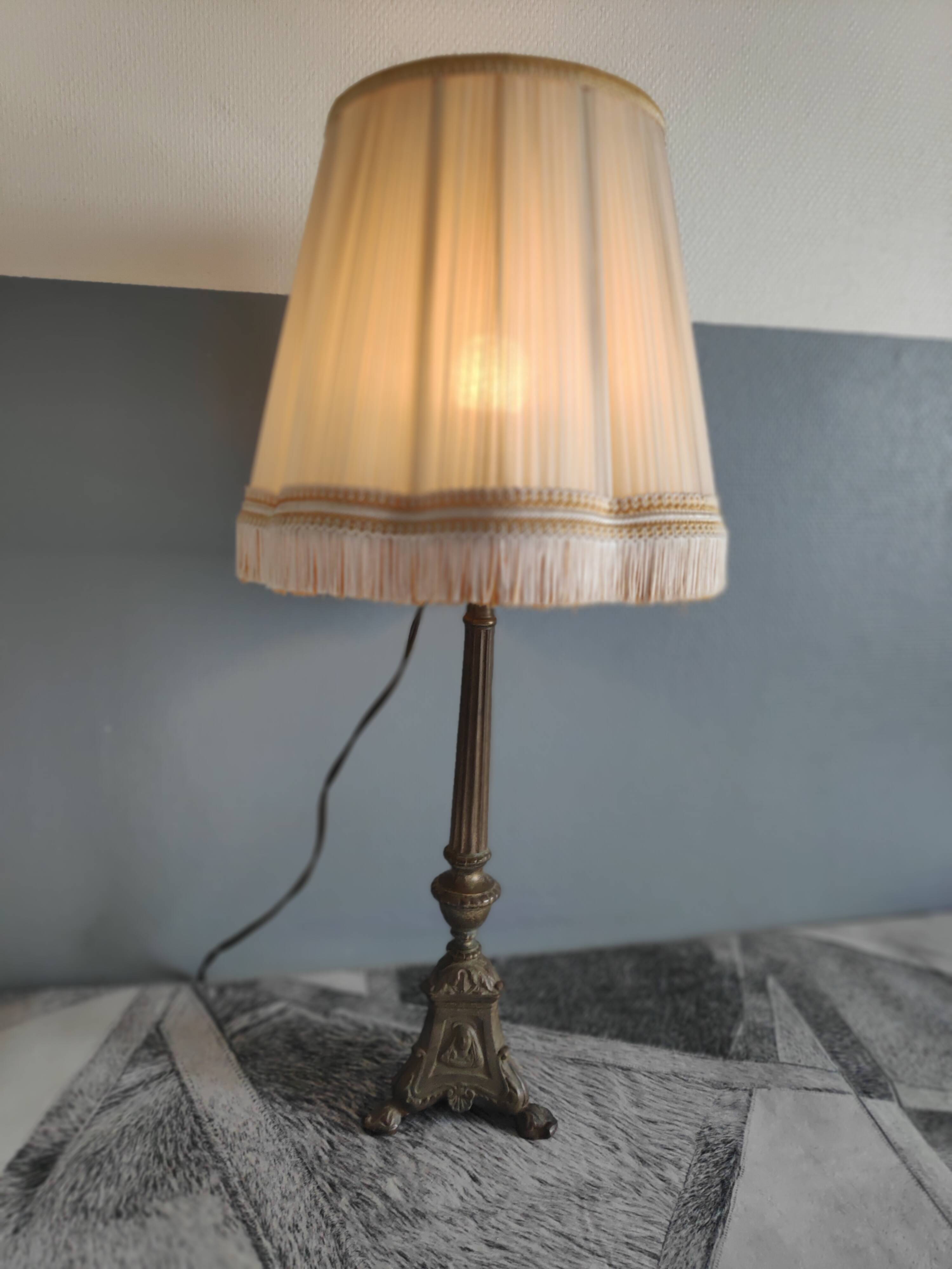 Old brass foot lamp and period lampshade