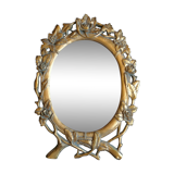 Miroir doré en résine à décor floral