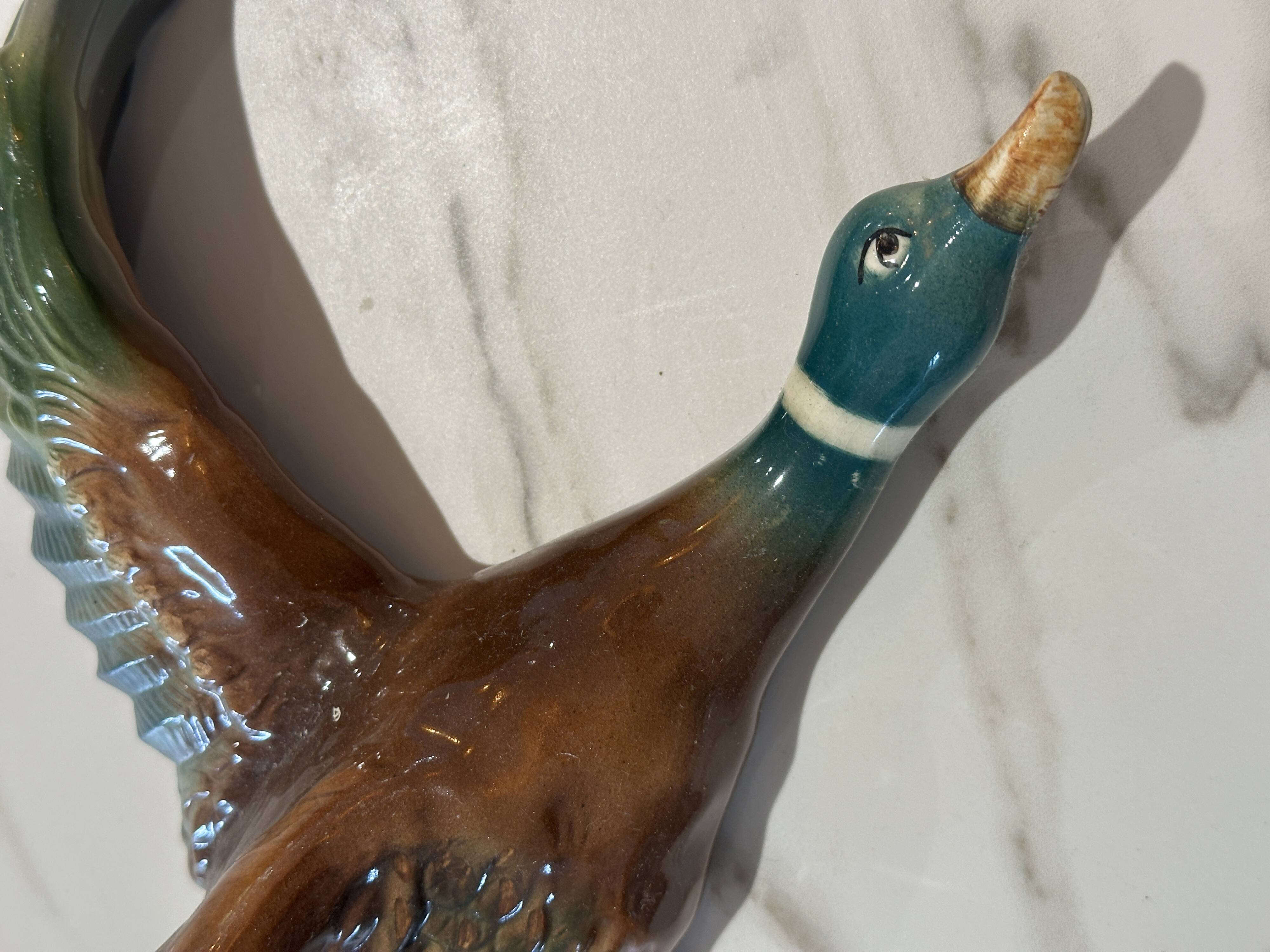 Mid century graduating flying ducks