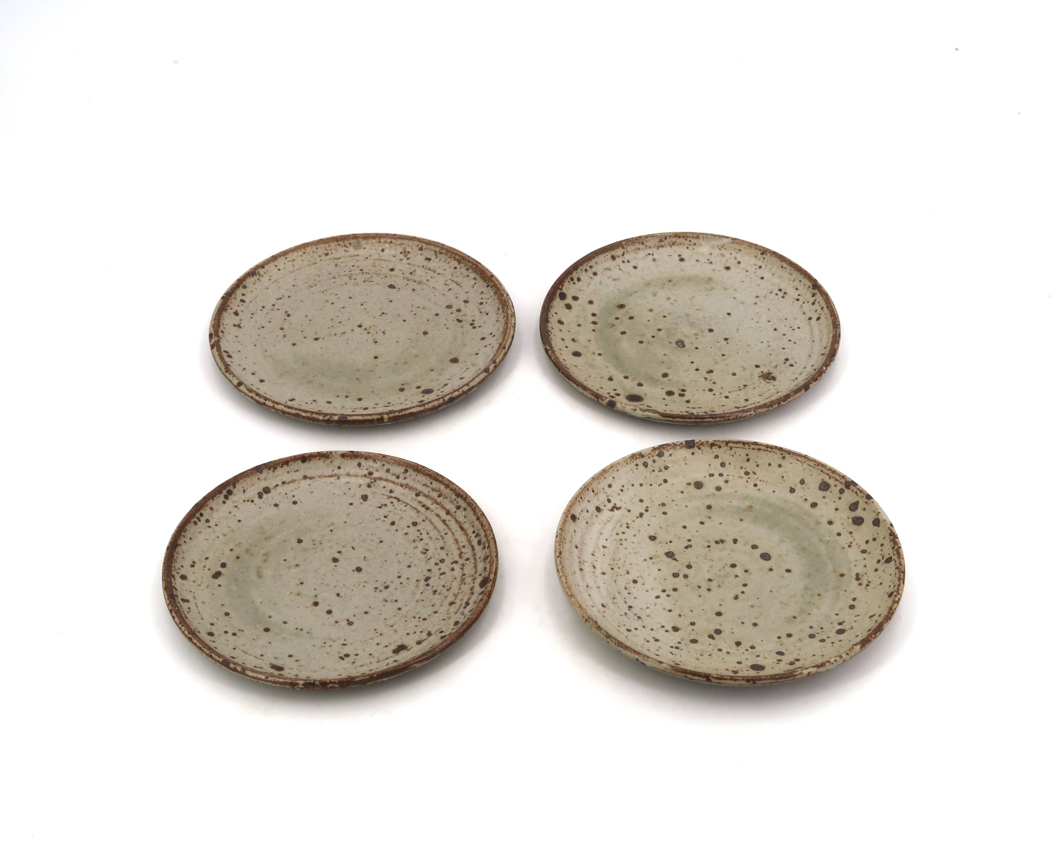 Dessert plates in pyrite stoneware by Gustave Tiffoche, ceramic from the 1970s.