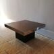 Square pedestal coffee table with mirror top