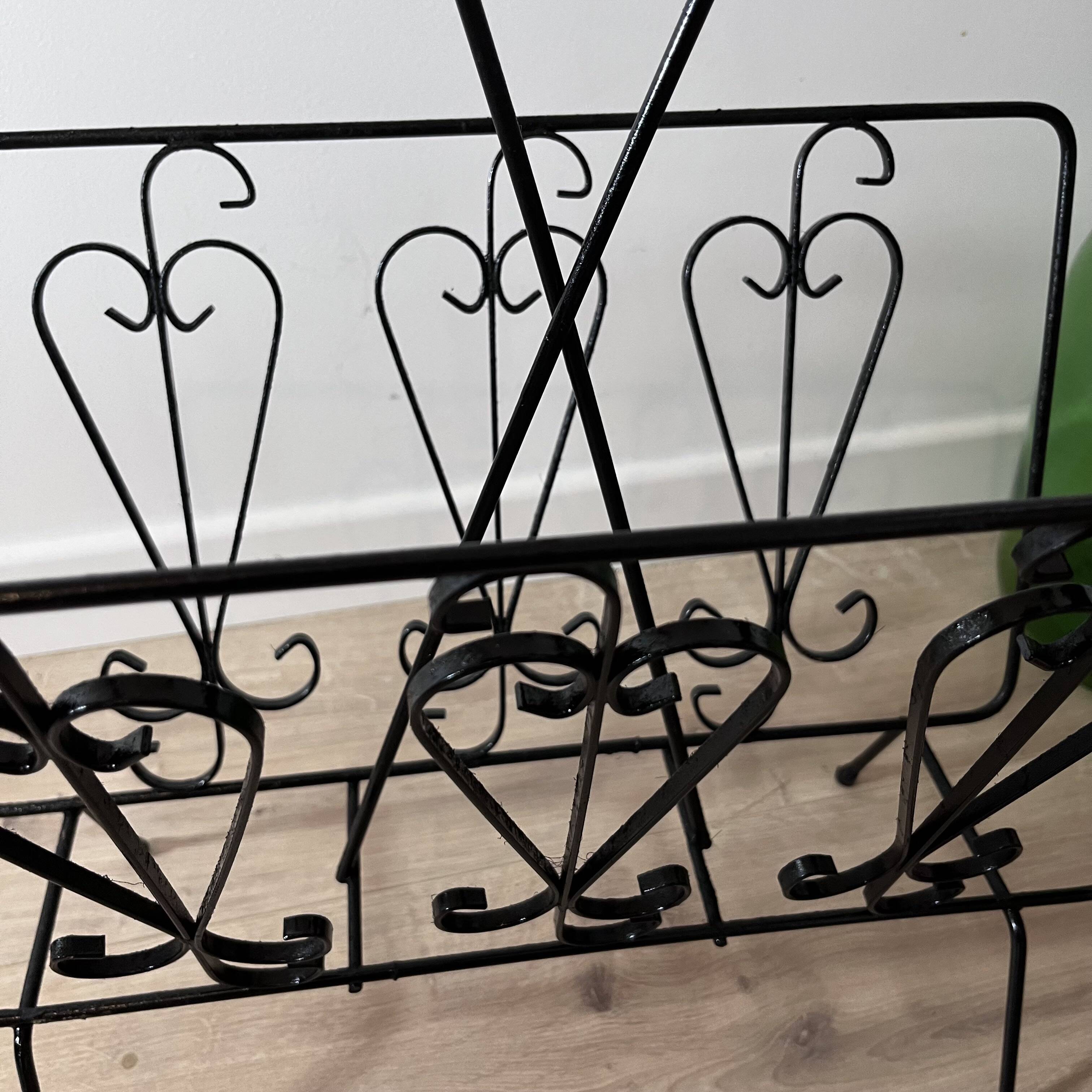 Black steel magazine holder