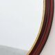 French Burgundy Lacquered Oval Mirror with Gilt Inner Edge, circa 1920