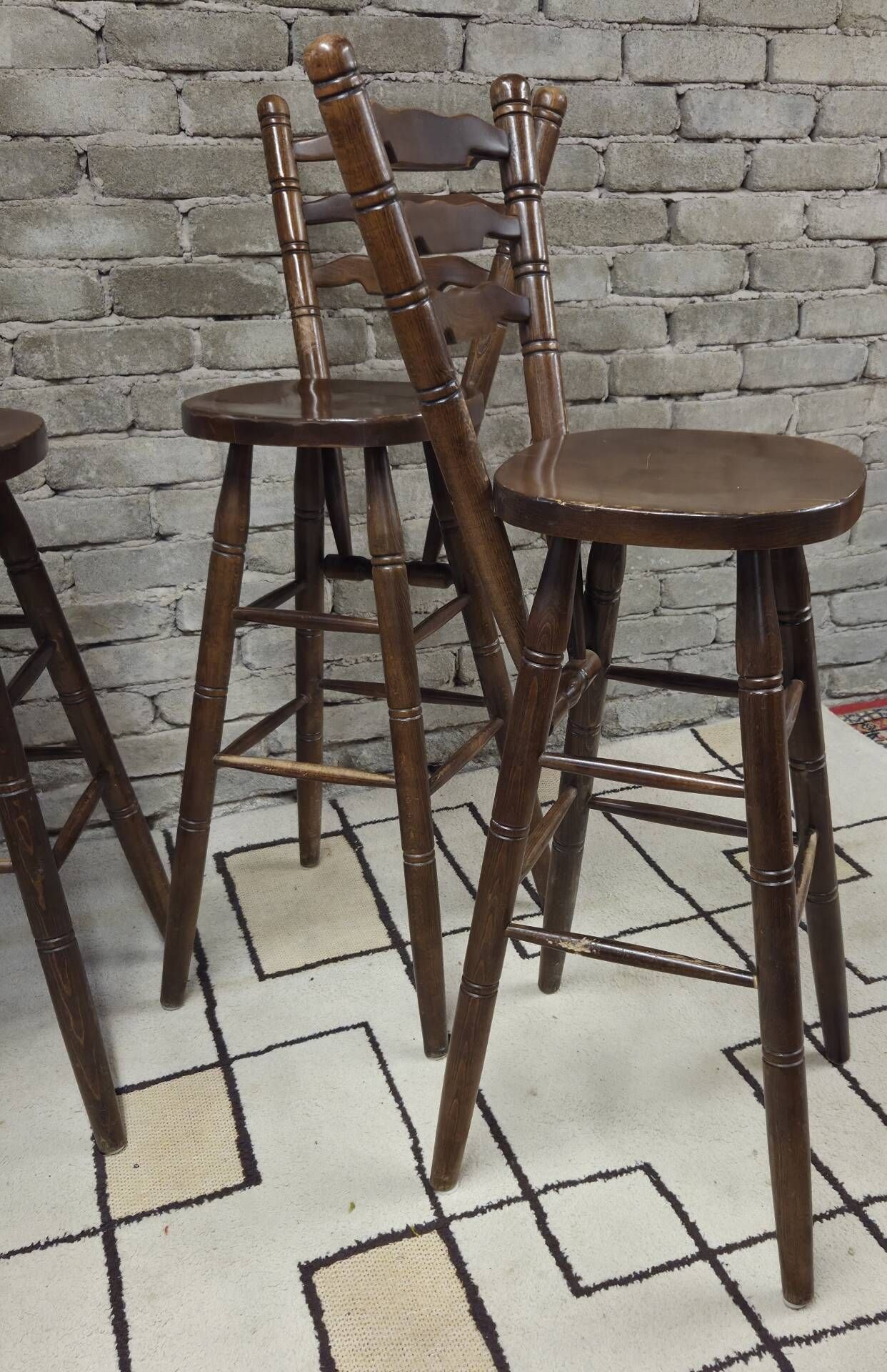 3 vintage wooden bar stools from the 60s/70s with a bistro spirit.
