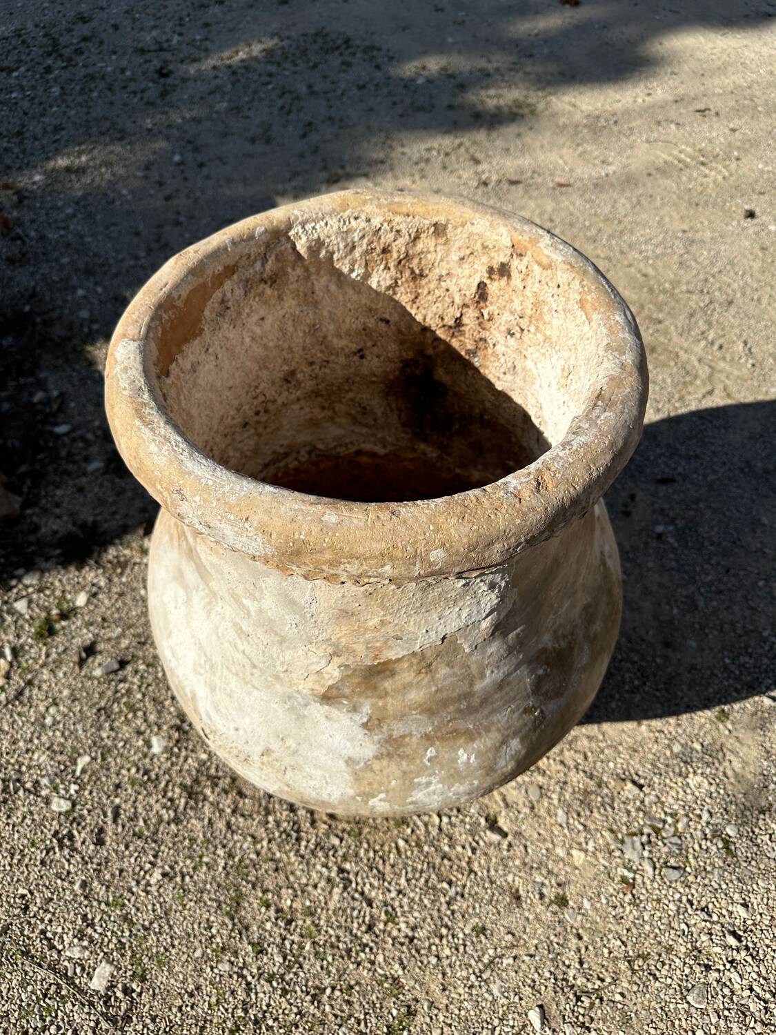 Ancient terracotta pottery jar
