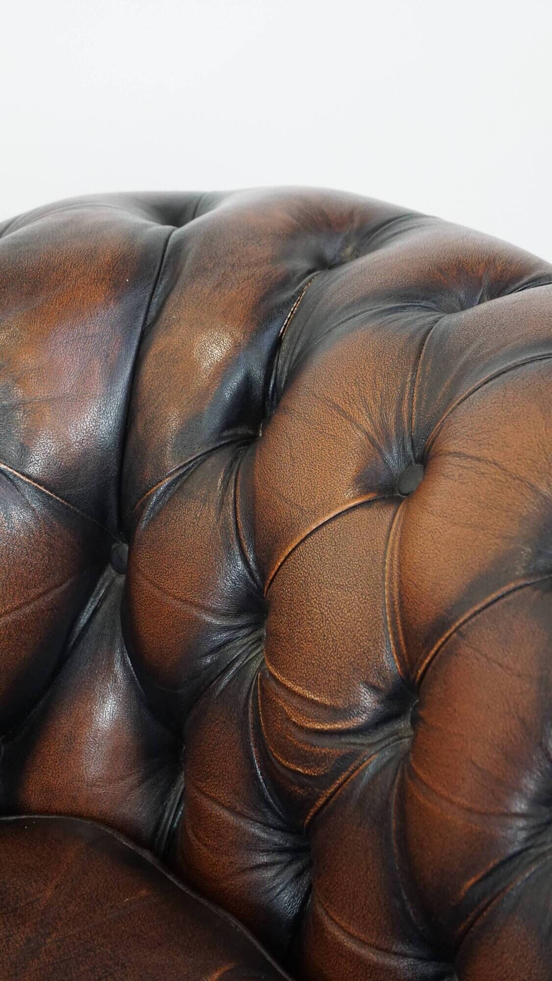 Classic English Chesterfield 2.5 seater sofa in brown cowhide