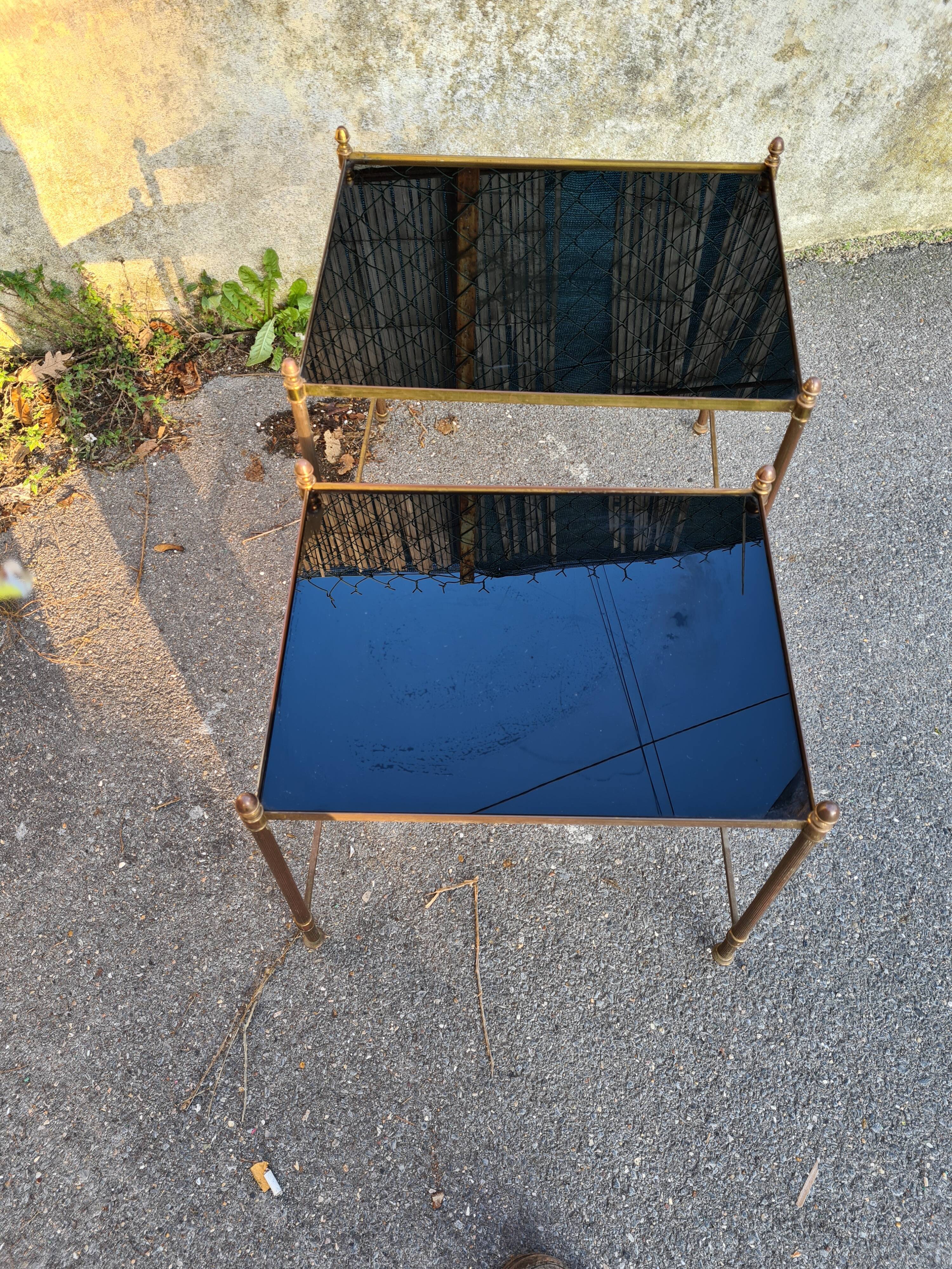 2 brass trundle tables and vintage black glass