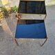 2 brass trundle tables and vintage black glass