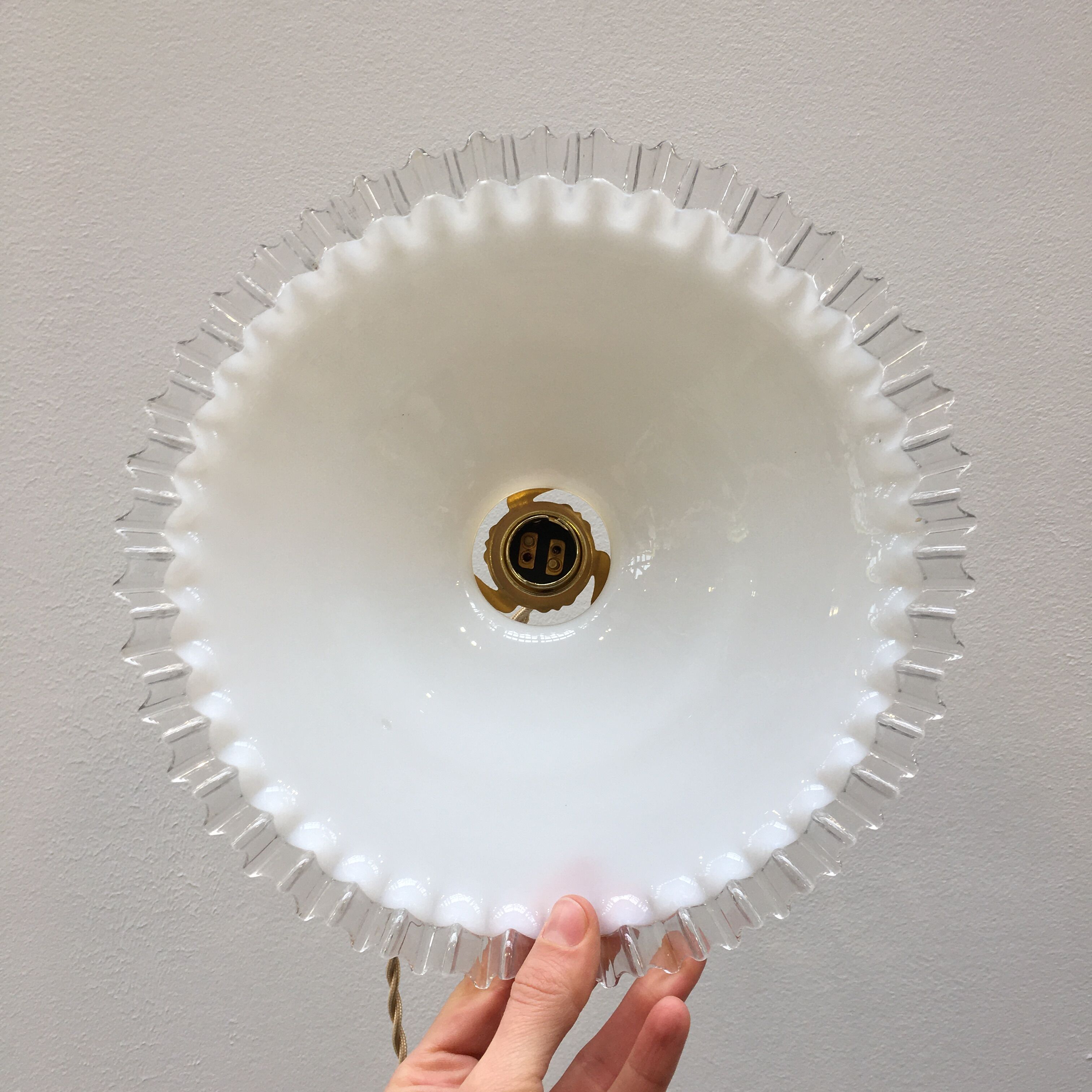 White opaline pendant lamp with transparent serrated edges