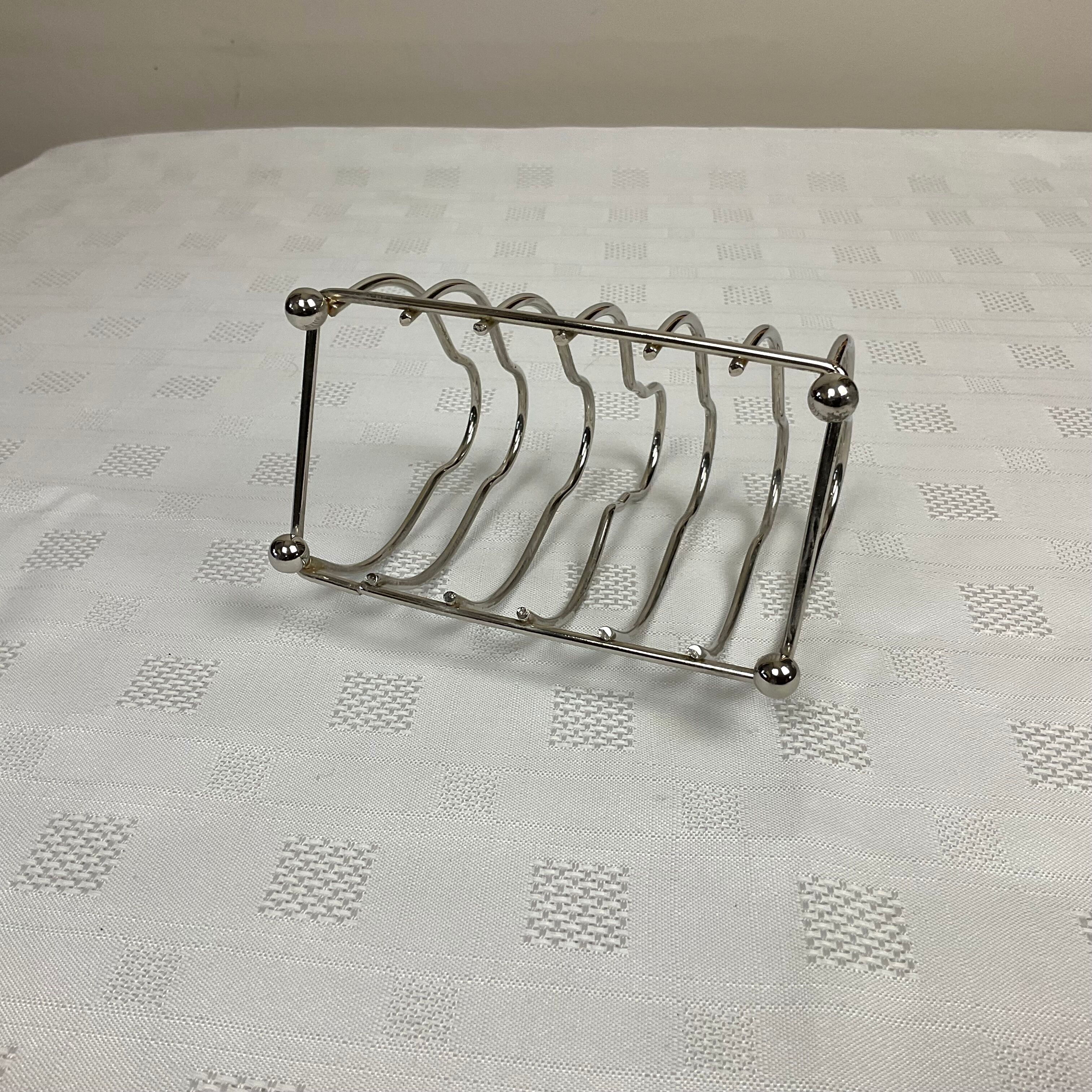Toast holder in silver metal