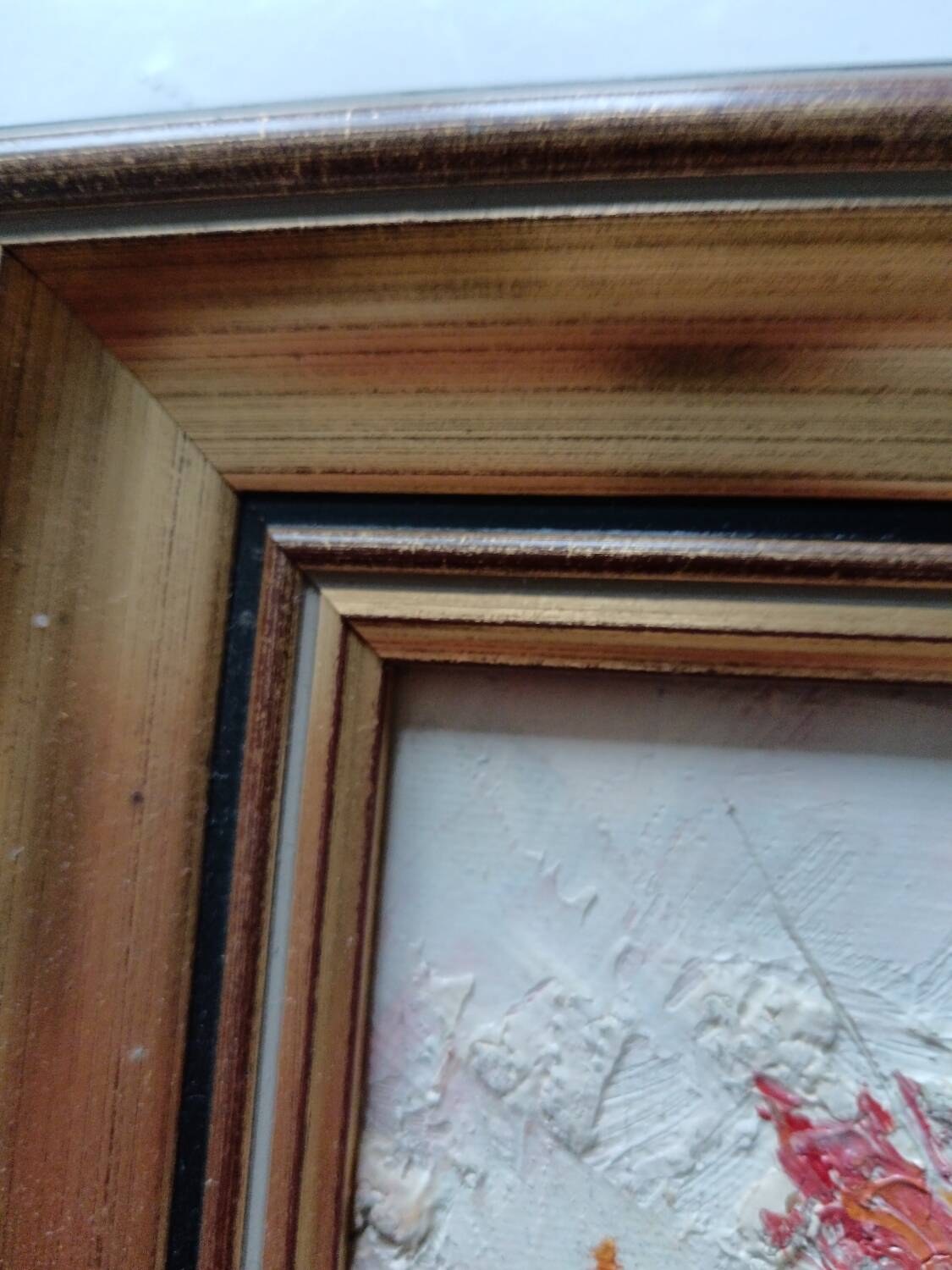 Oil of a bouquet and its lovely frame