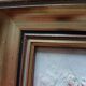 Oil of a bouquet and its lovely frame