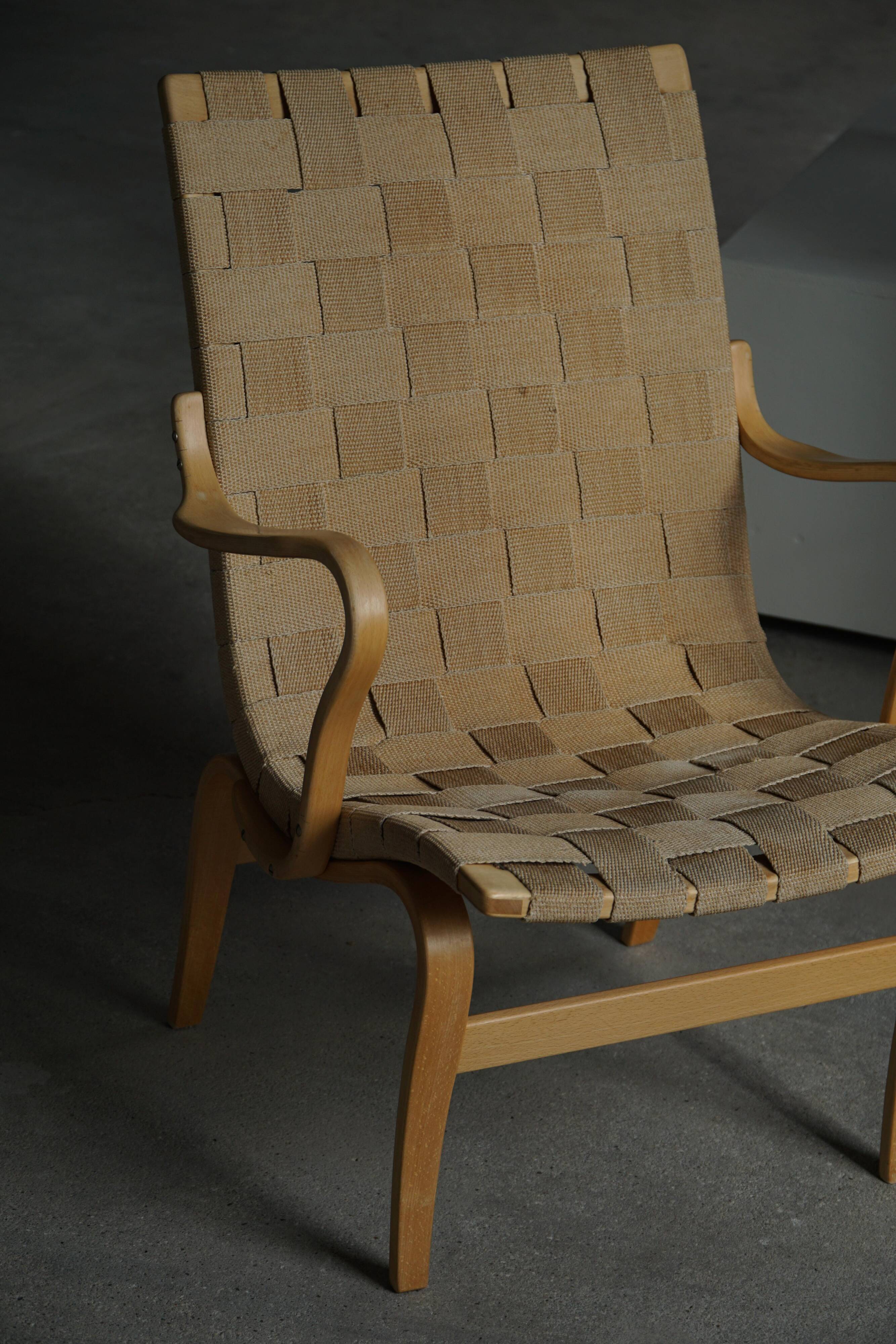 Pair of Swedish armchairs from the mid-century by Bruno Mathsson, model "Eva", 1960s.