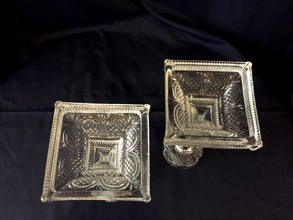 Pair of molded glass candle holders