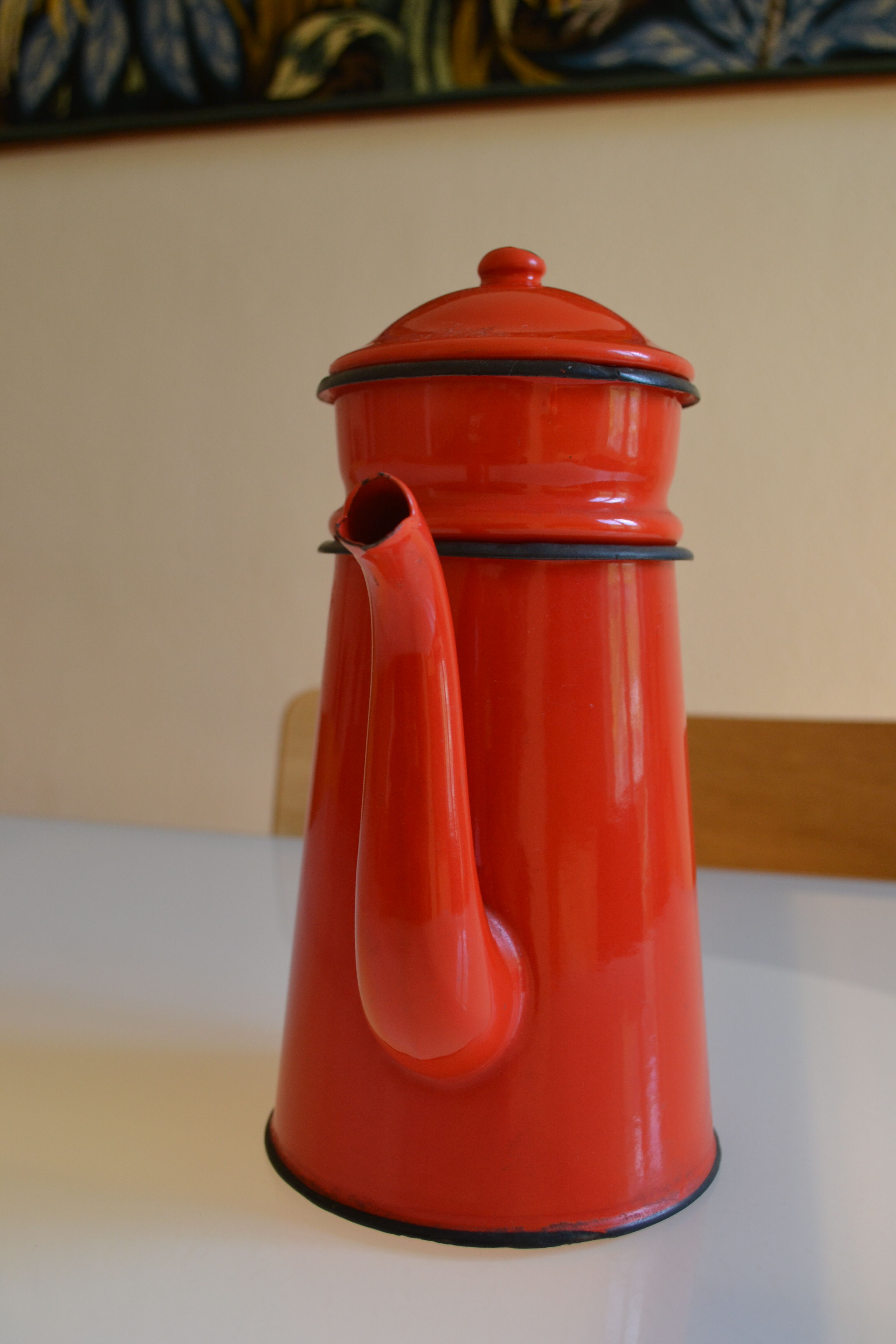 Vintage coffee maker in red and black enamelled sheet