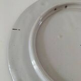 Decorative earthenware plate signed Charolles
