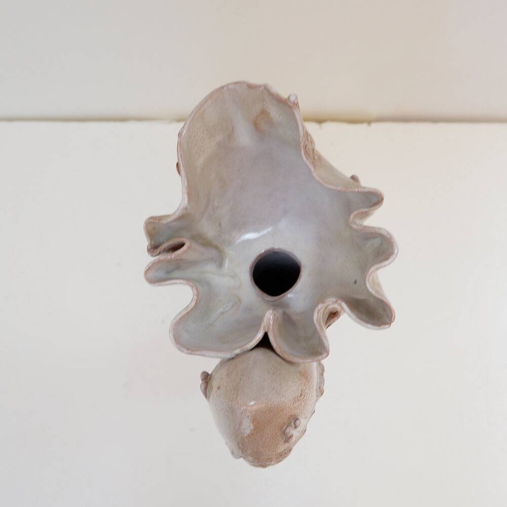 Ceramic sculpture of a female face - flower vase decoration