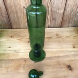 Green glass standing apothecary bottle