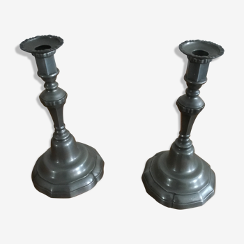 Pair of tin candlesticks