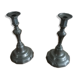 Pair of tin candlesticks