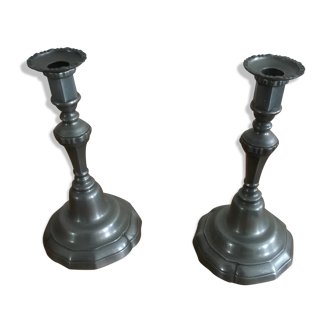 Pair of tin candlesticks