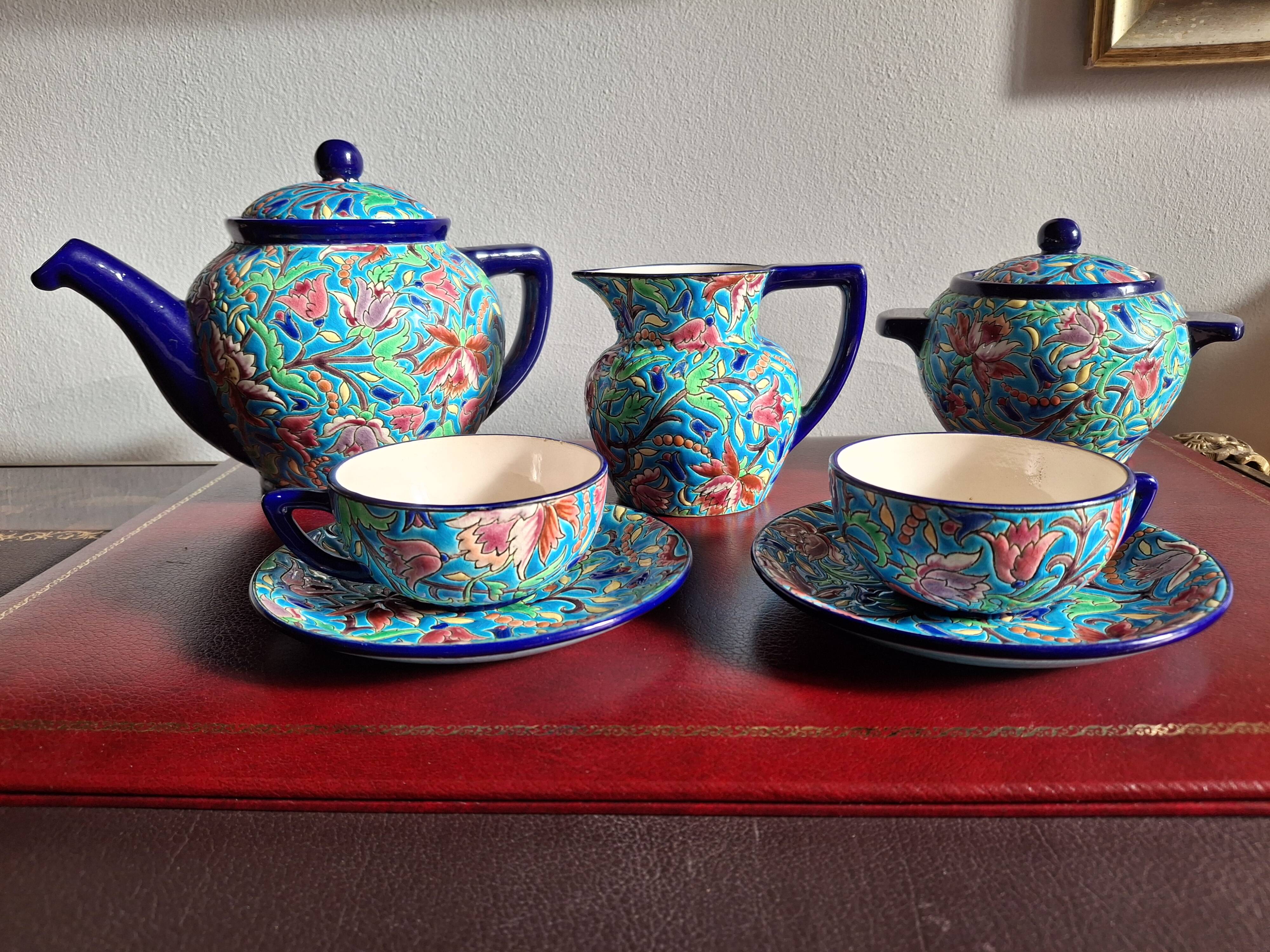 Cloisonné enamel tea service from Longwy in excellent condition.