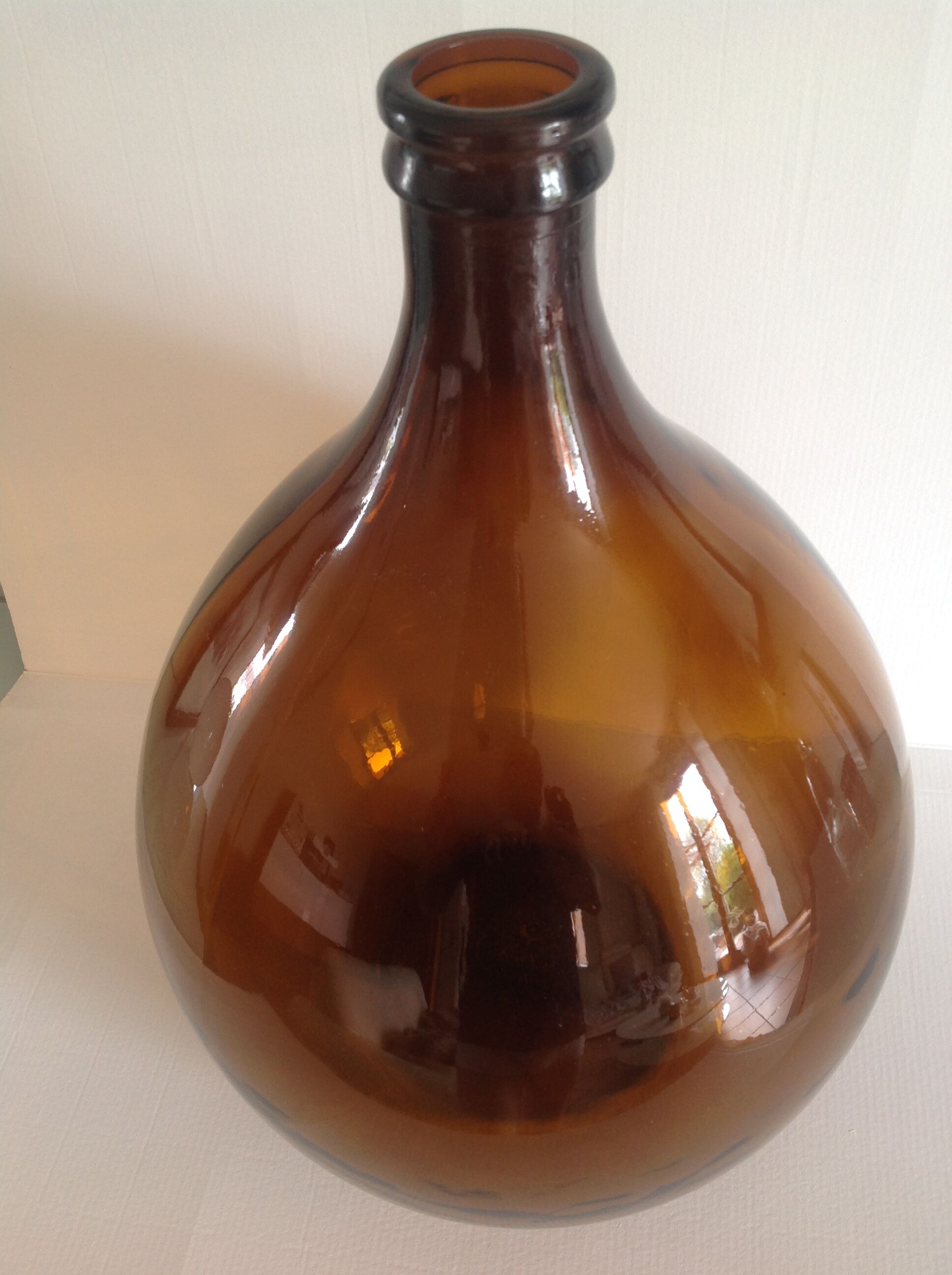 Old demijohn bonbonne smoked glass