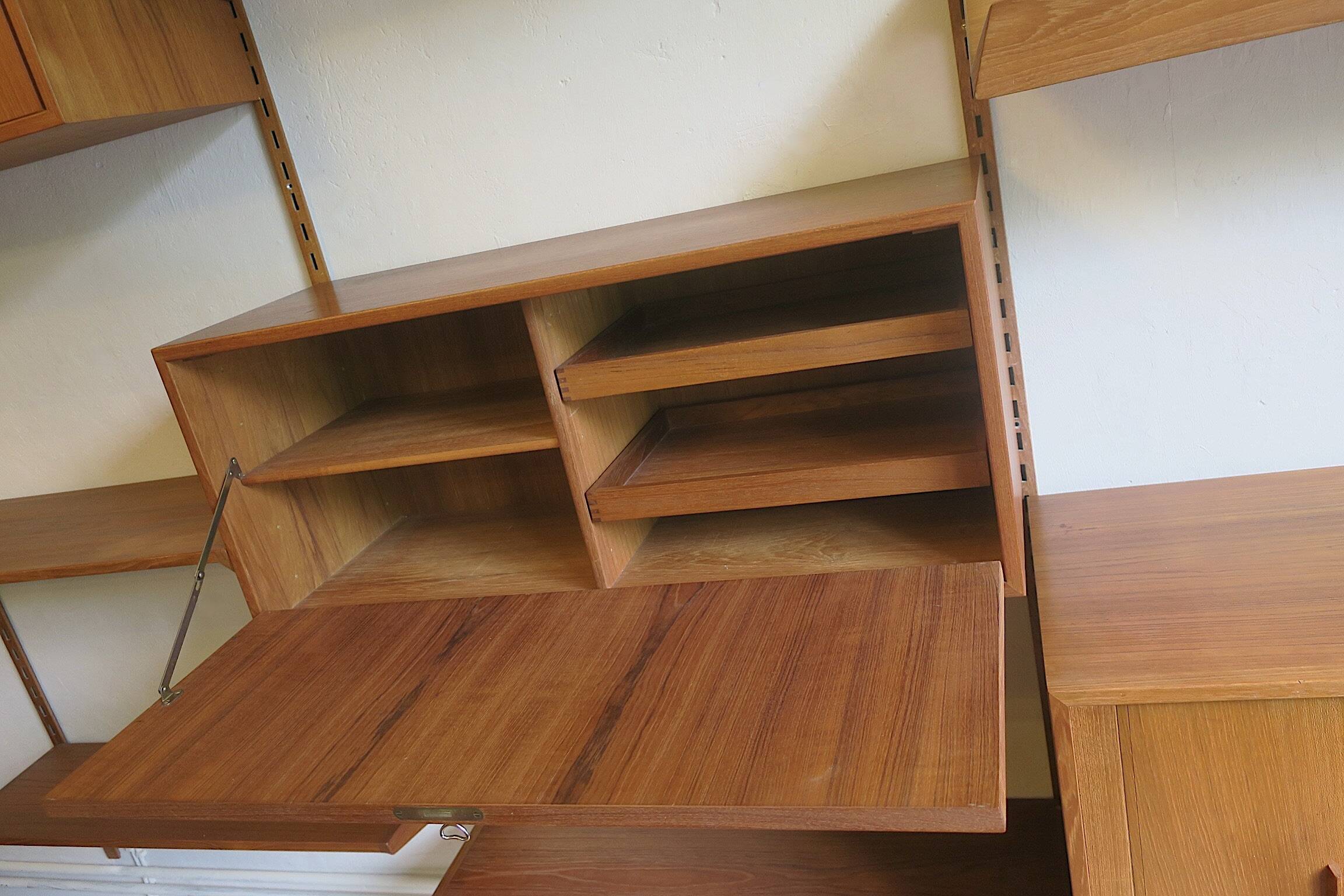 Modular 3-compartment teak wall shelving system with desk and lighting by Kai Kristiansen for FM, Denmark, 1960s