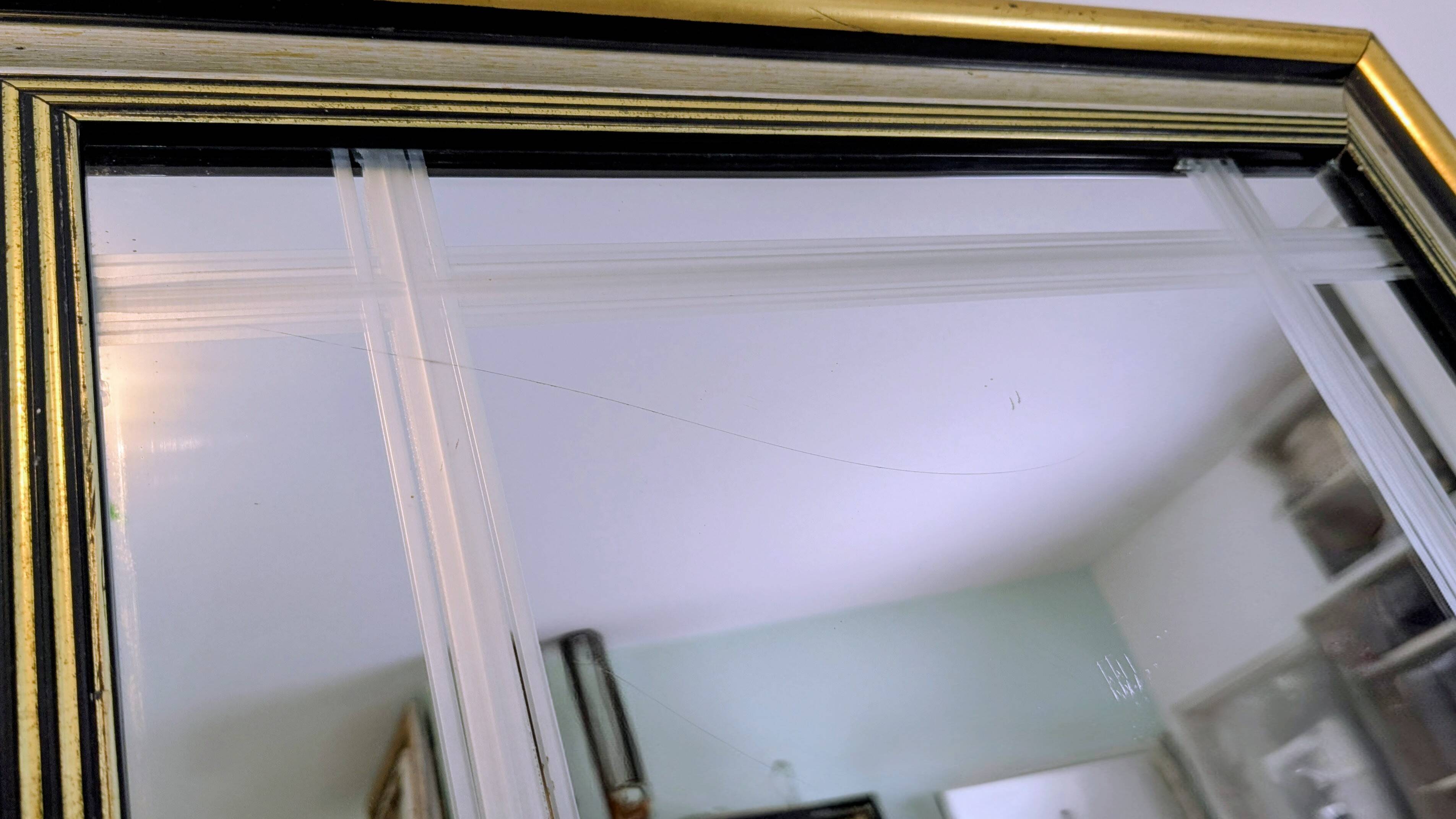 Antique mirror with a gold frame, classic elegance 49 x 38 cm