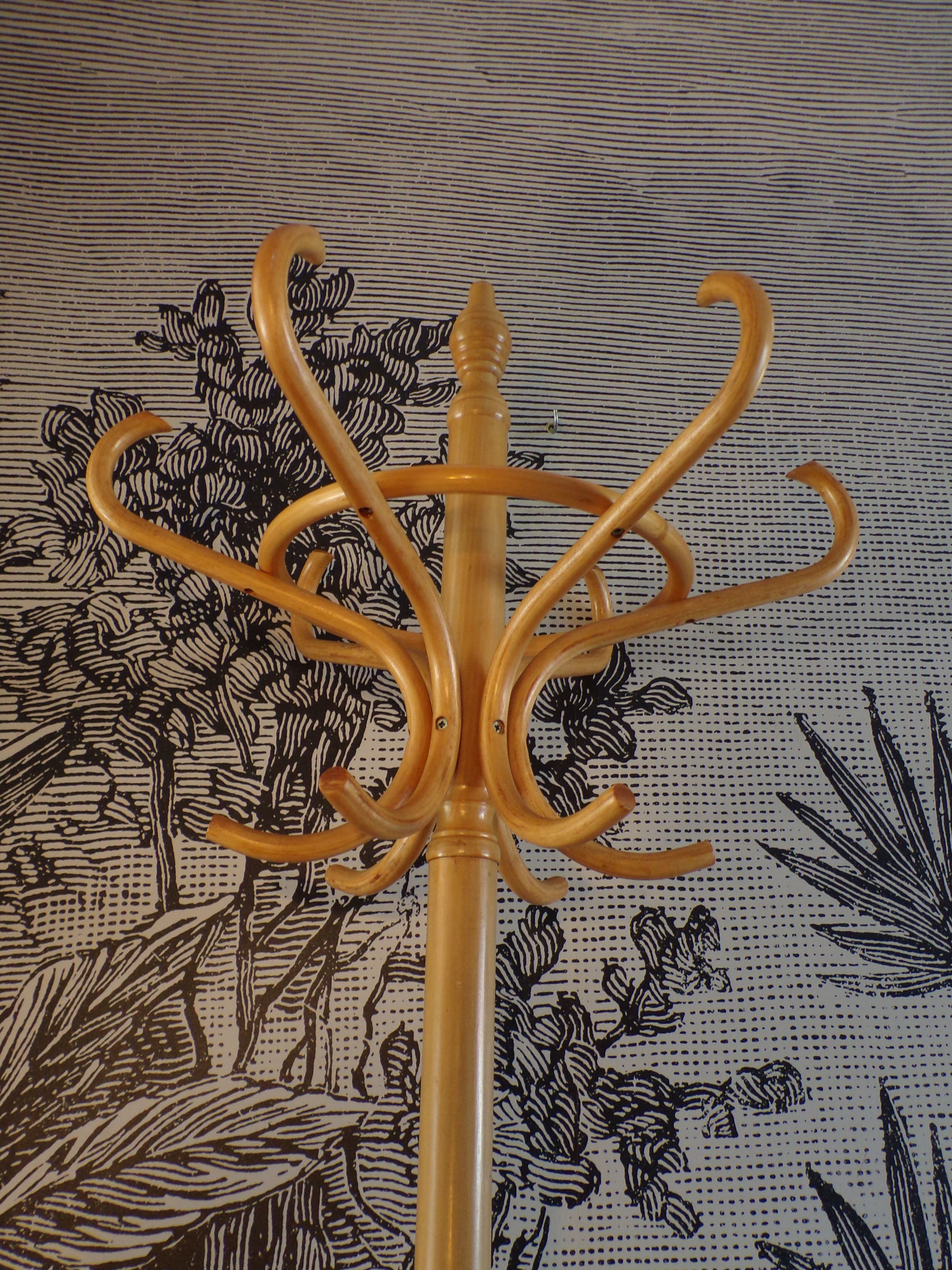 Curved wooden parrot coat rack