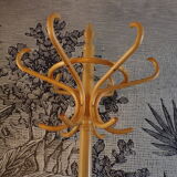 Curved wooden parrot coat rack