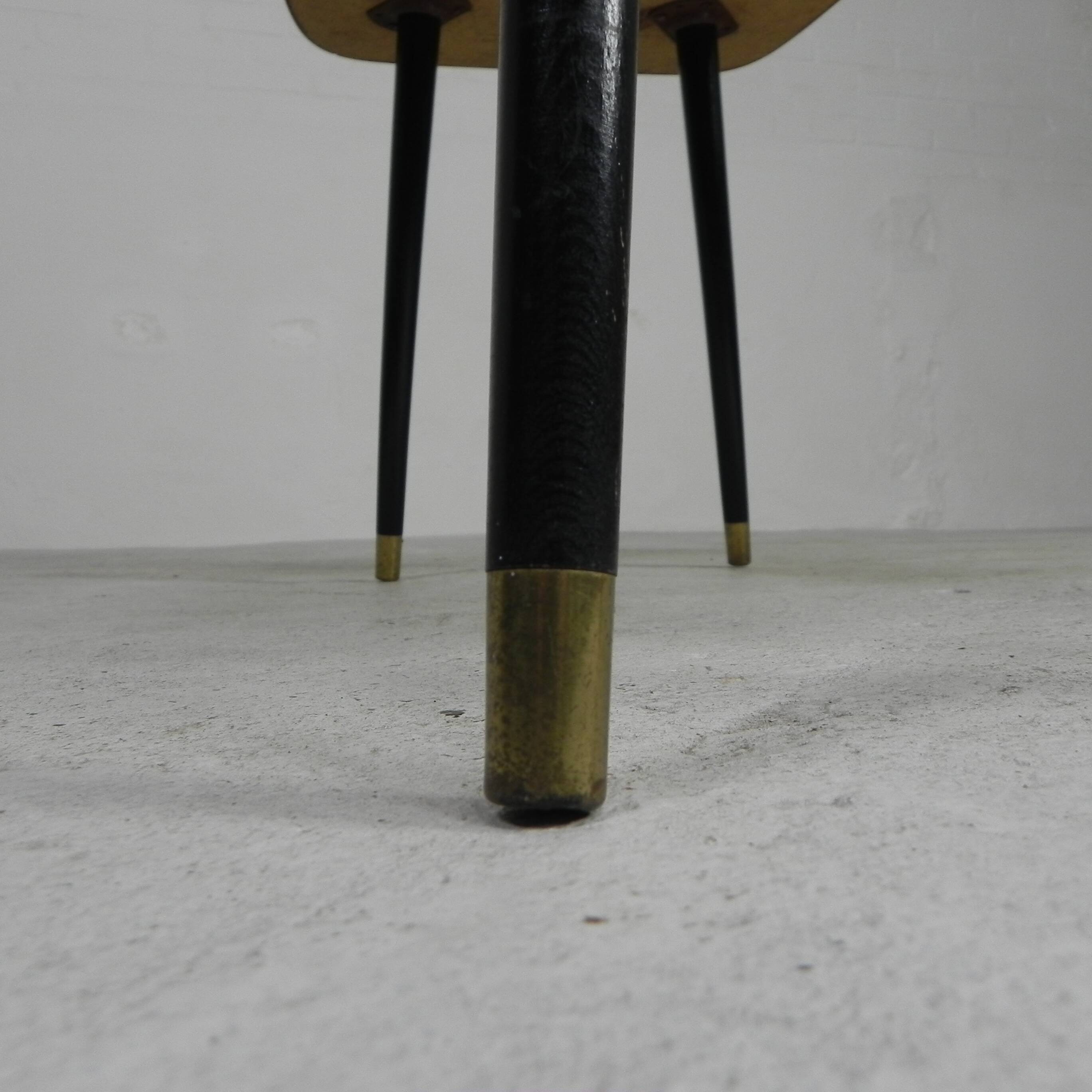Vintage coffee table with glass top and angled legs